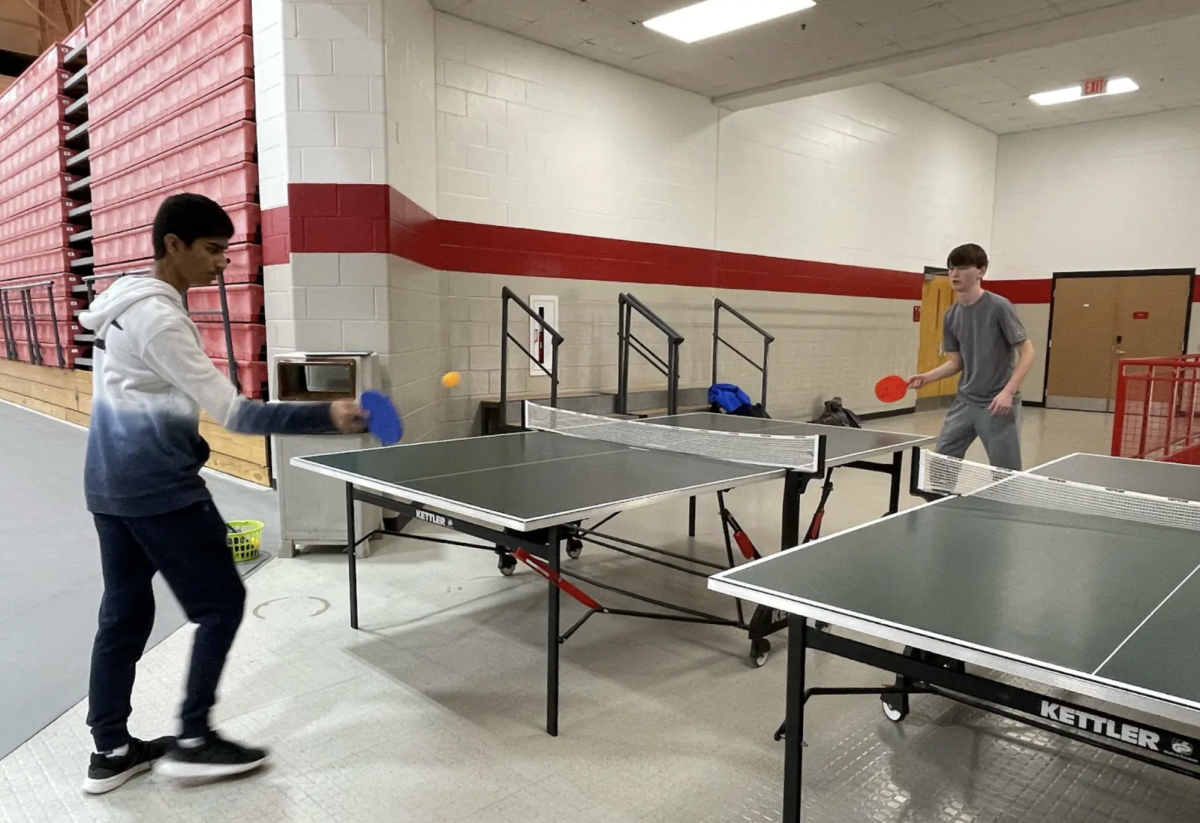 During ping pong club, junior Aarit Raju and sophomore Nate Blake battle in a match. The group plays in a friendly and non competitive manner after school. “I like spending time with my friends. It’s a fun experience to do this and hangout with them here,” Raju said. “It’s just about how I feel ping pong, if I really wanted to I’d shoot faster plays.”